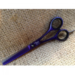 Jaguar Pastall Plus "Purple" 5" 40 tooth White Line Comfort class thinner or texturing scissor.